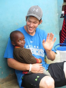 Clayton Kershaw spending a few moments with a young boy.